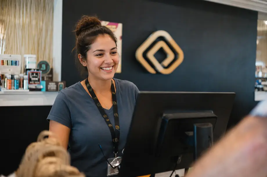 Dispensary staff preparing cannabis orders for delivery